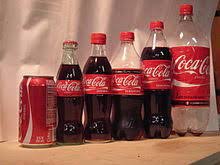 LATA E GARRAFA DE COCA-COLA\